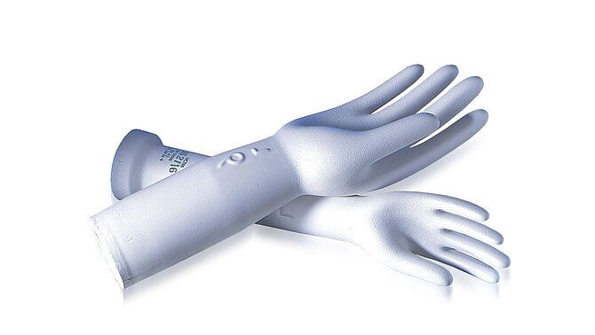 White glove dipping shapes on white background