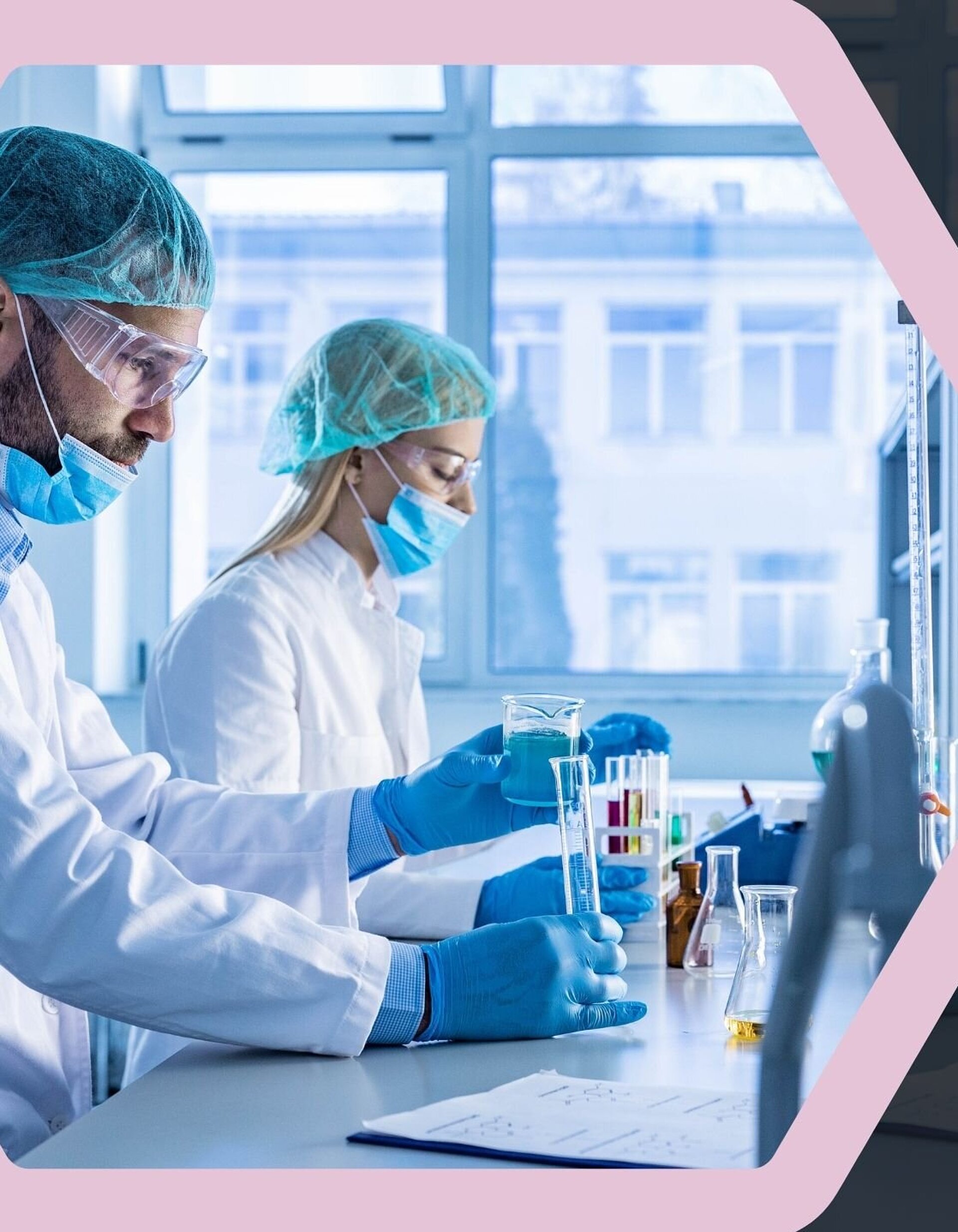 Two researchers in a laboratory conducting experiments, representing scientific work in metal-free orthopedic implant research.